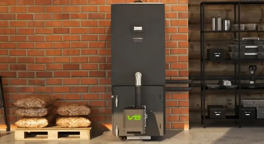 Nowoczesny piec na pellet z zielonym logo VG. Obok paleta z workami pelletu. Dofinansowanie do pieca na pellet może być Twoje!